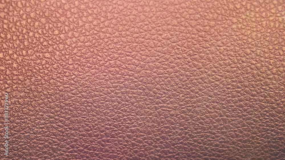 texture of upholstery seating in the bus. color