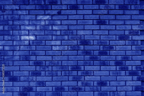 Blue brick wall. Interior of a modern loft. Background for photo and video filming. The facade of a brick building.