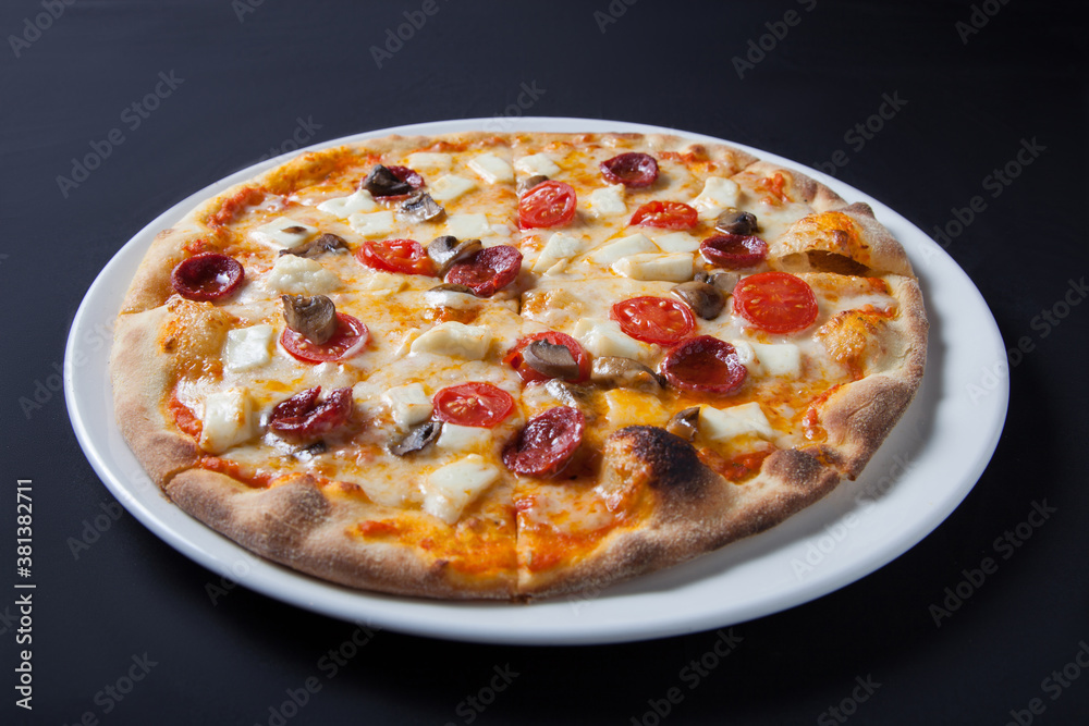 Pizza with sausage and mushrooms
