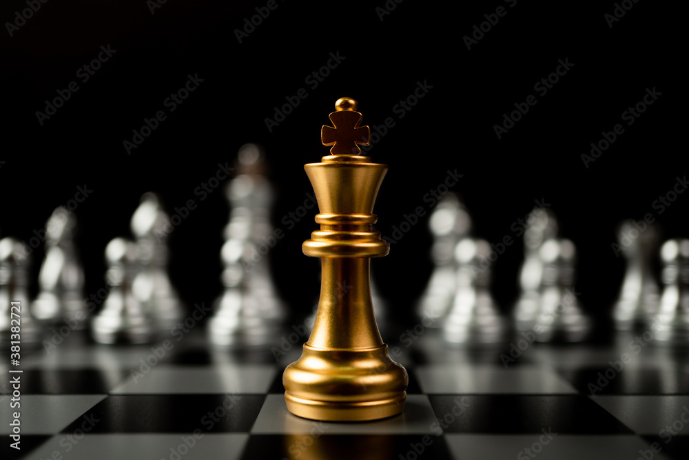 Golden King chess standing in front of other chess, Concept of a leader must have courage and challenge in the competition, leadership and business vision for a win in business games Golden King chess standing in front of other chess, Concept of a leader must have courage and challenge in the competition, leadership and business vision for a win in business games