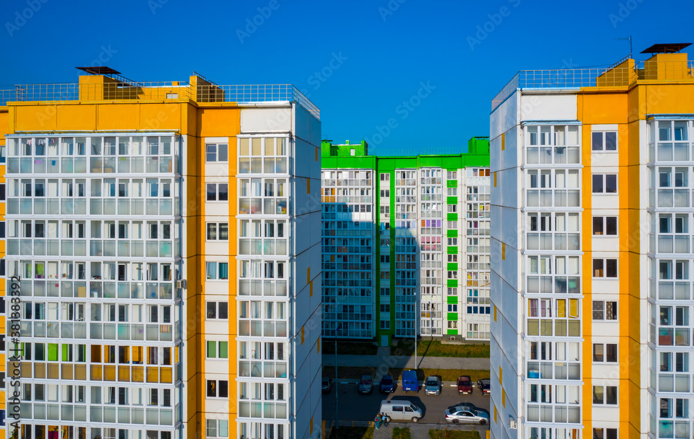new area with panel multi - storey buildings painted in different colors