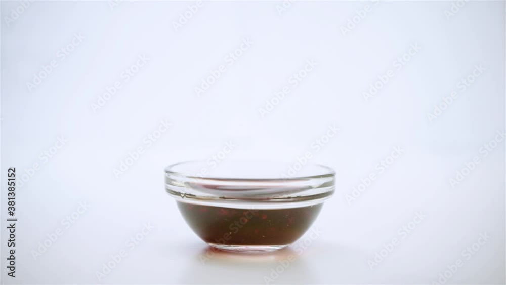 Dipping sushi rolls in a bowl with soy sauce. Dipping sushi rolls in a bowl with soy sauce.