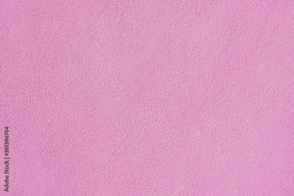 Fototapeta premium Texture of pink plaster. Interior of a modern loft. Abstract rough background. The facade of an old house.