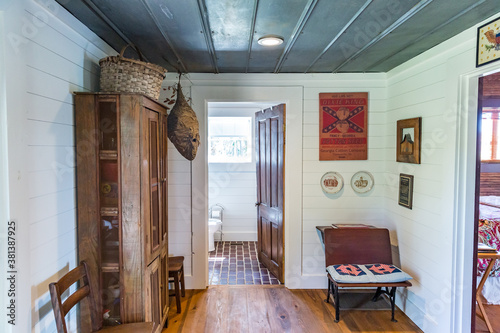 Long and Narrow kitchen in a hunting cabin rental with a metal interior ceiling and shiplap walls photo