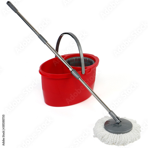 Vászonkép cleaning mop and bucket isolated on white background