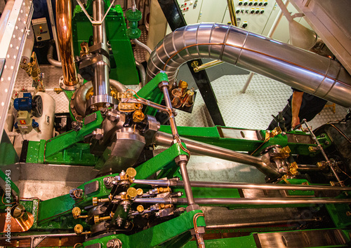 Fototapeta Inside view of an engine of an old steamship on the river Elbe