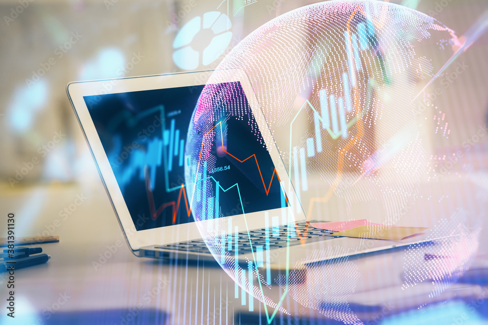 Double exposure of forex chart and work space with computer. Concept of international online trading.