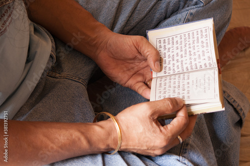 Sikh reading Gurbani closeup