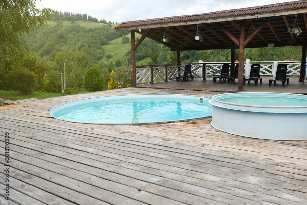 Fototapeta premium Panorama water pool on rooftop view with nature background