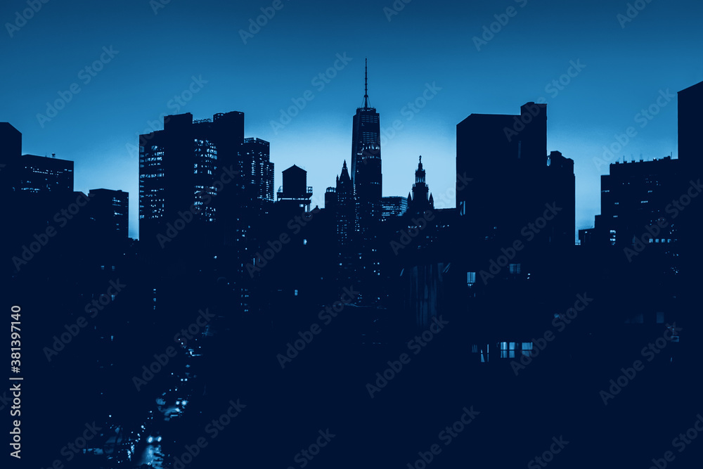 New York City skyline lights at night in blue monochrome colors