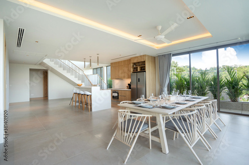 Interior design in pool villa  house and home feature dining table and dining chair in dining room with pool view