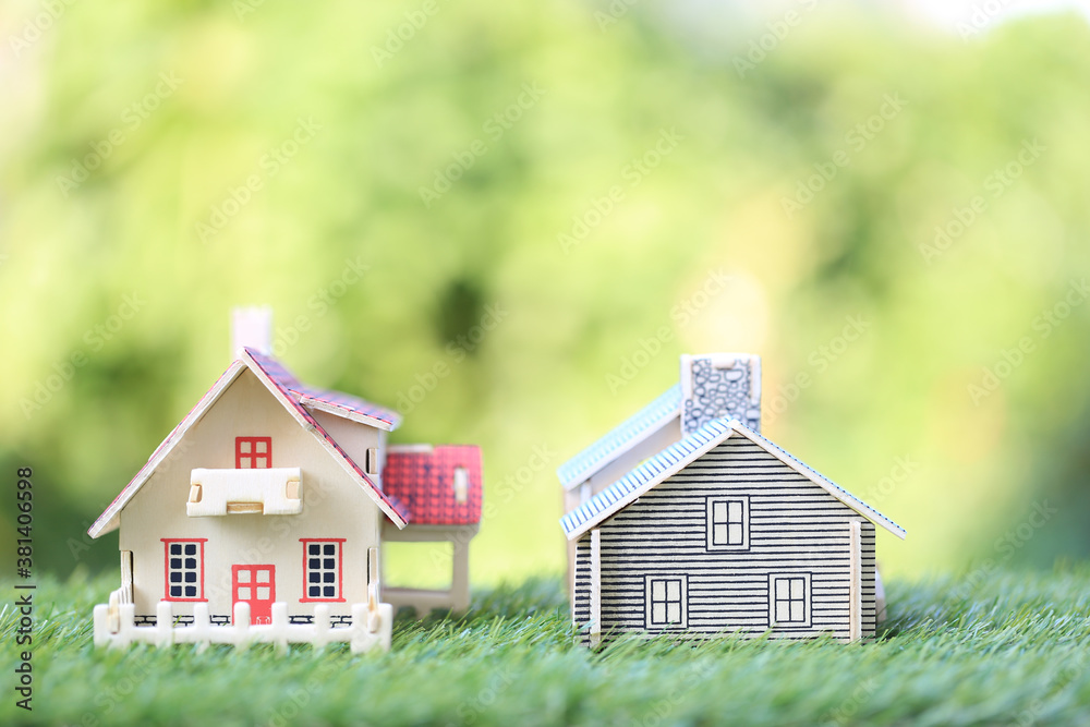 Finance, Model house on natural green background, Business investment and real estate Finance, Model house on natural green background, Business investment and real estate