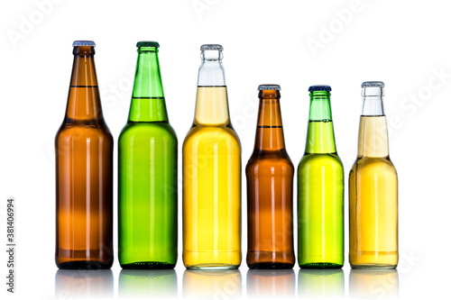 Group of Six bottles of beer isolated on white background photo