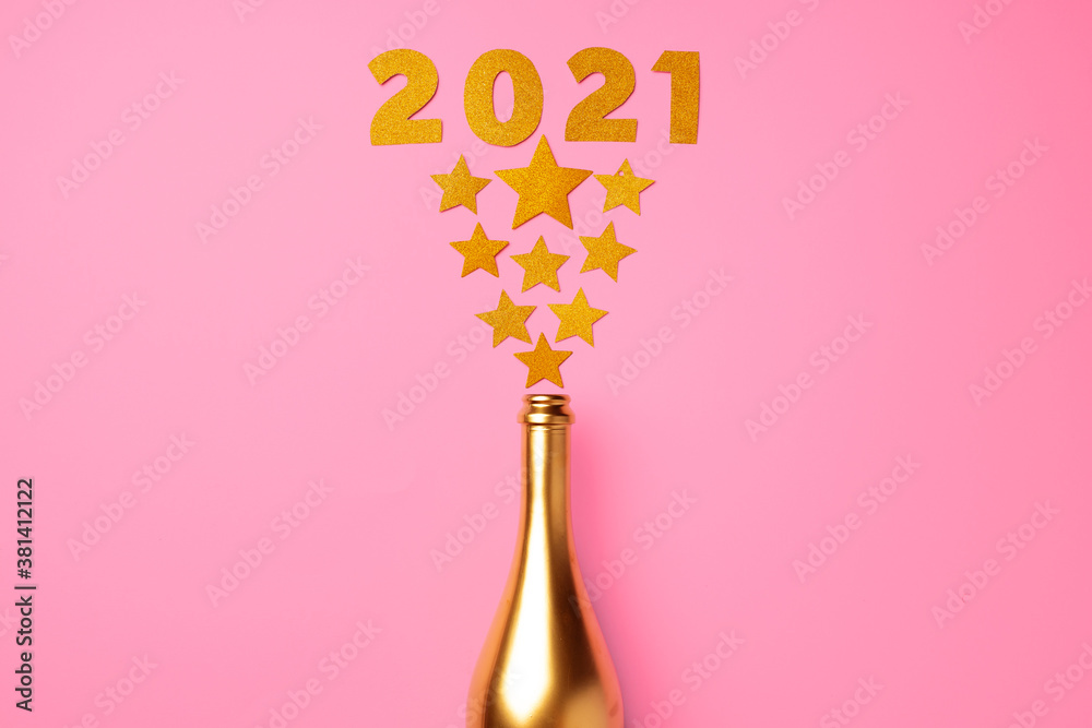 Champagne bottle with confetti flat lay top view Champagne bottle with confetti flat lay top view