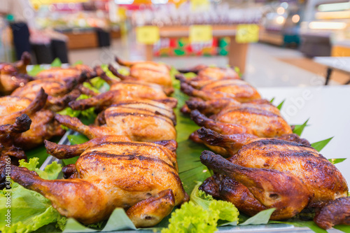 Grilled chicken on the table for sale in the supermarket.