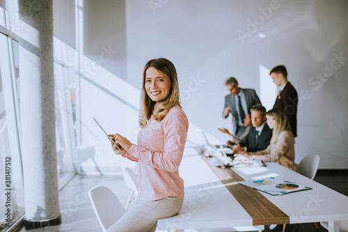Young business woman using ...