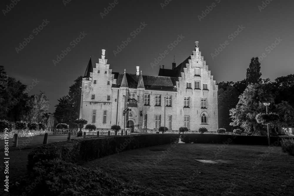 Cortewalle Castle, in Beveren, Belgium, at night - black and white