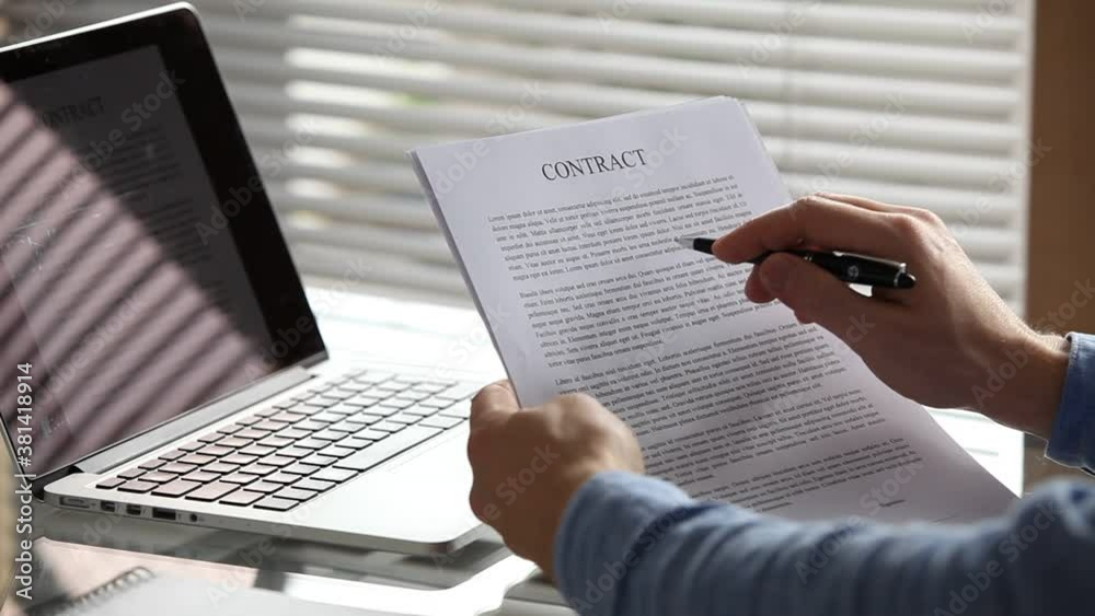 reading contract agreement printed document, corporate business deal