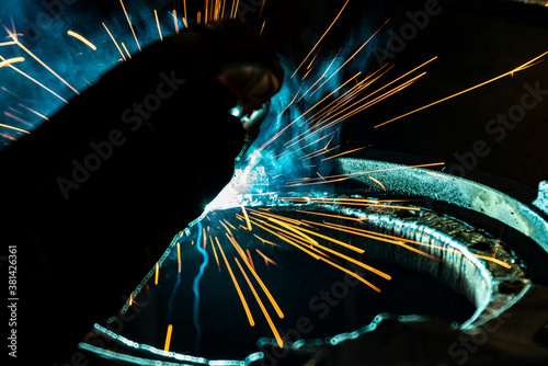 Tableau sur toile Sparks from electro gas welding at work in an electromechanical workshop