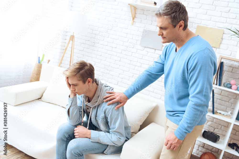 Fototapeta premium Couple hold on to shoulder of son and support him