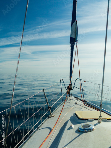 Yachting on sail boat during sunny weather