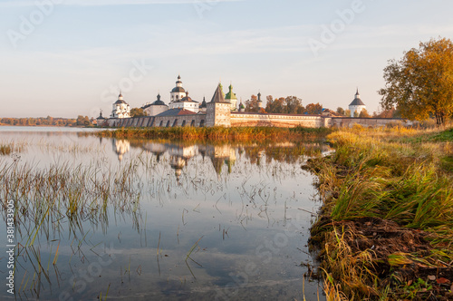 Ancient orthodox monastery, landscape overlooking the lake, dawn