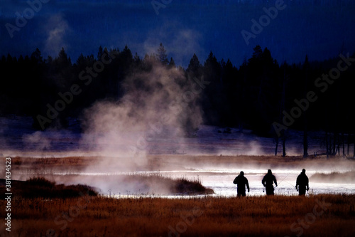 Several Men Walking Towards Fishing Hole River © Lane Erickson