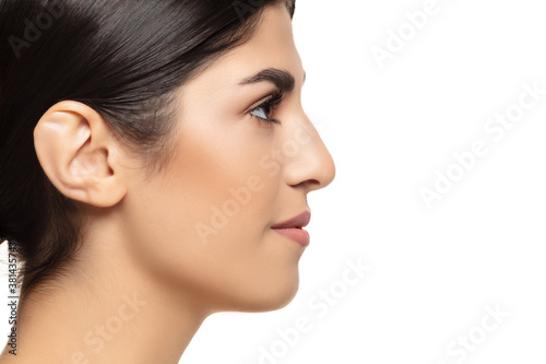 Clear. Portrait of beautiful jewish woman isolated on white studio background. Beauty, fashion, skincare, cosmetics concept. Copyspace for ad. Well-kept skin and natural fresh look. Healthy and shiny.