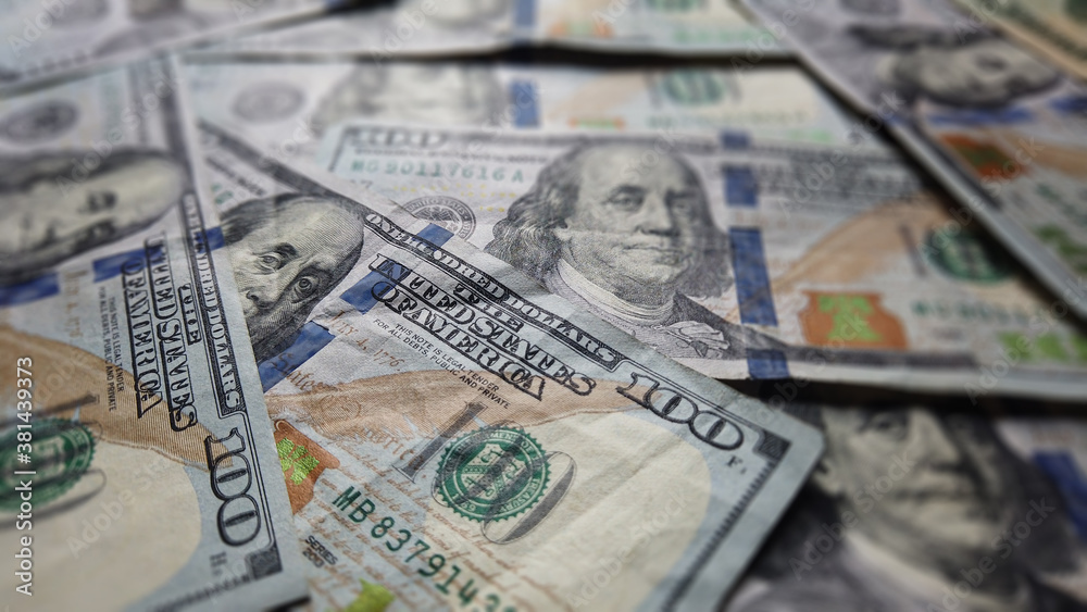 Hundred dollar Ben franklin bills in pile for business and financial concept. American US dollar federal reserve background texture. Cash and prosperity for economic impact and financial abundance. Hundred dollar Ben franklin bills in pile for business and financial concept. American US dollar federal reserve background texture. Cash and prosperity for economic impact and financial abundance.