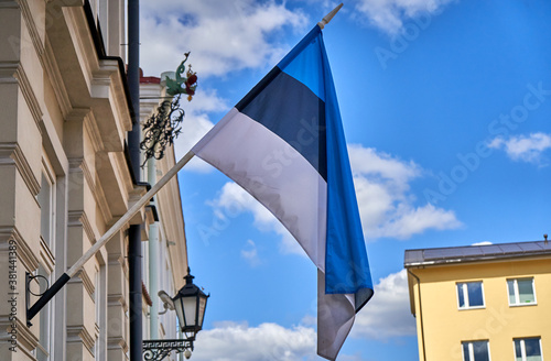Obraz na płótnie Estonian flag on a sky on a sunny day