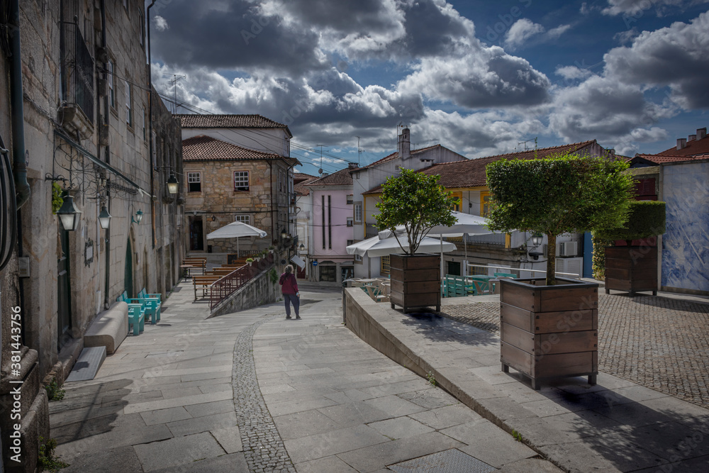 Walking Through The Village Ponte De Lima, Portugal, With Beautiful Clouds And Blue Sky