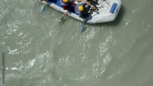 Gornoaltaisk, Altai, Russia - July 25, 2020: adventure team doing rafting on the cold waters of the Katun River in Altai. slow motion photo