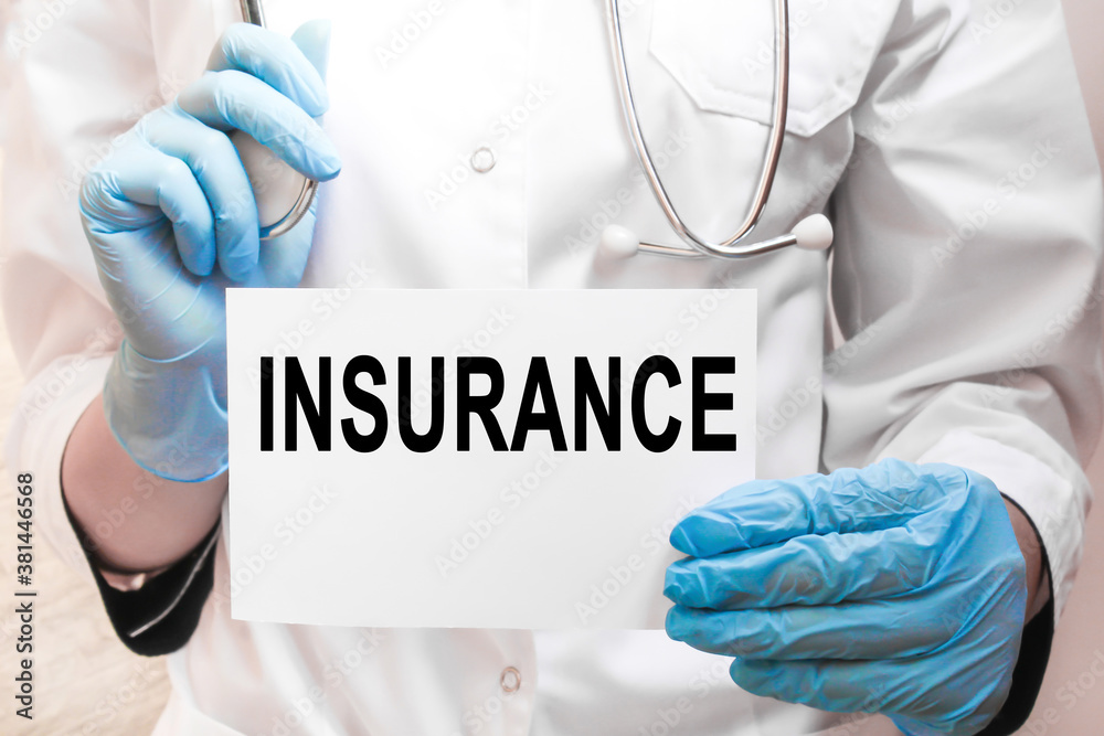 Doctor holding a card with text, medical concept Doctor holding a card with text, medical concept