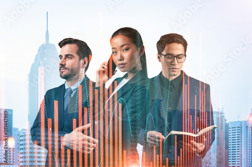Photography Group of business colleagues in suits as a part of multinational corporate team working on forecasting trading corporate strategy at fund