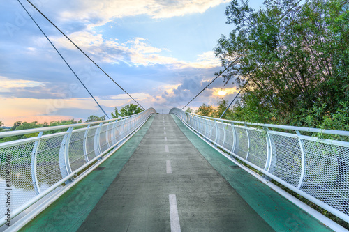 Photography Empty bicycle bridge (called “Freedom bridge”) connecting two countries Slovakia