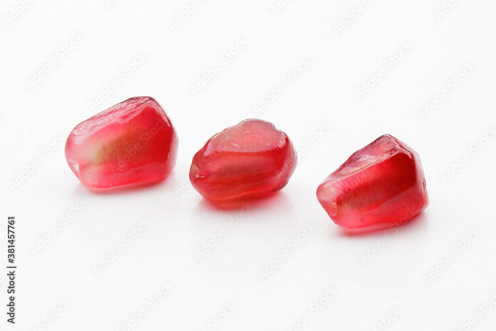 pomegranate seeds red autumn fruit on white background pomegranate seeds red autumn fruit on white background