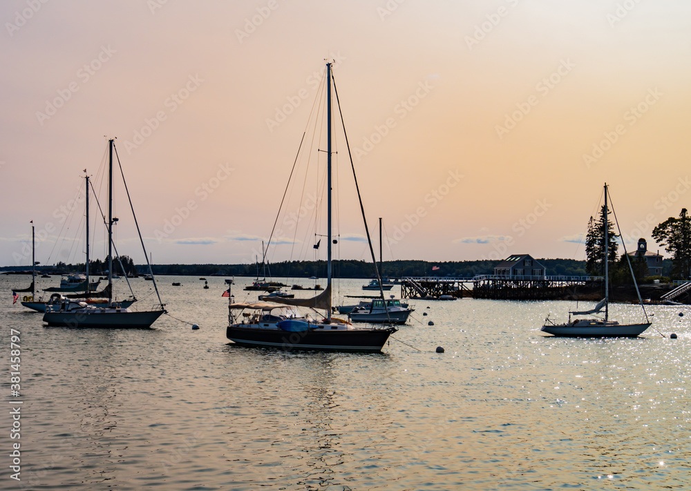 sailing schooners moored in the evening on the Maine coast
