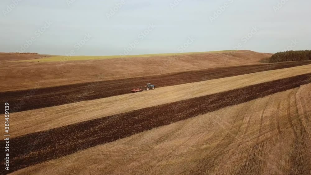 tractor plows the land 2 tractor plows the land 2