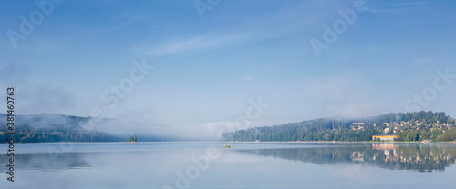 Fog over Lake Lirno and the mountains of the Czech Republic