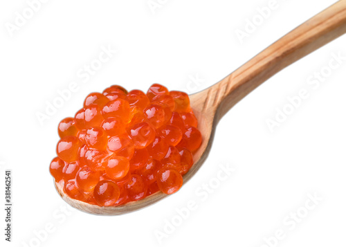 Red Caviar on a wooden spoon. Salmon Fish salted caviar. Raw seafood. Delicacy food. White background.