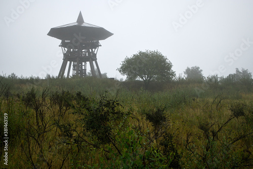 Der Eggeturm auf dem Preußischen Velmerstot im herbstlichen Nebel photo