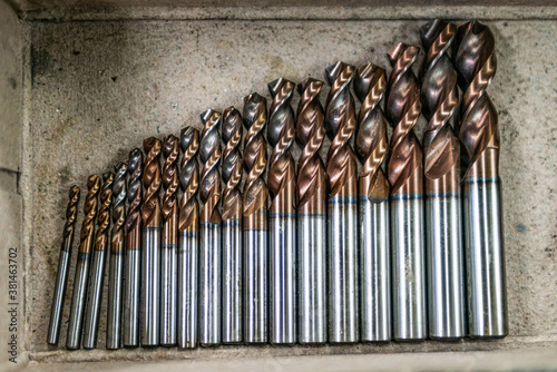 Flat lay various Size of cutting tools used carbide Endmills for machining center in metal work