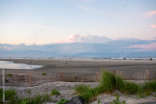 A Gorgeous Beach View With Plants Dunes and a Small Wooden Fence in North Wildwood New Jersey