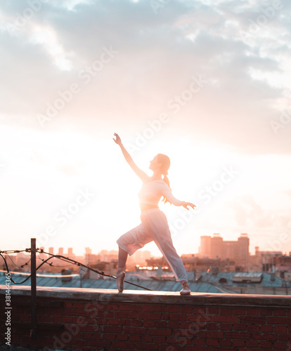  girl dancing on the roof