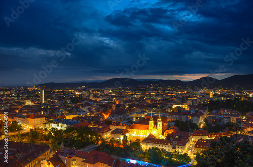 Storm with dramatic clouds over the city of Graz, with Mariahilfer church and historic buildings, in Styria region, Austria © Aron M  - Austria
