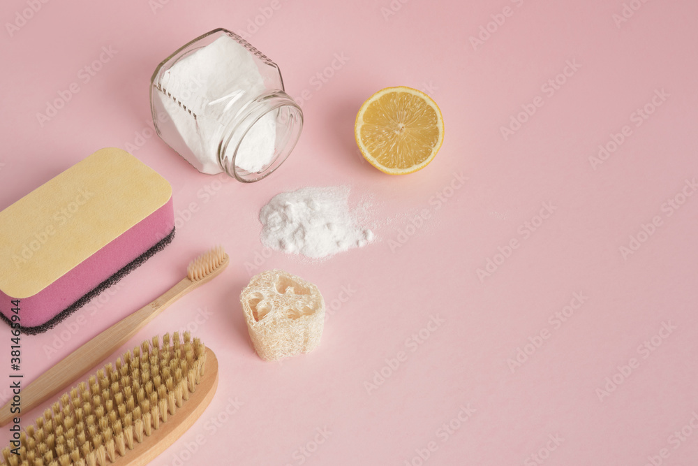 Eco friendly natural cleaning tools and products on pink background , Zero waste cleaning concept. Plastic free detergent concept Eco friendly natural cleaning tools and products on pink background , Zero waste cleaning concept. Plastic free detergent concept