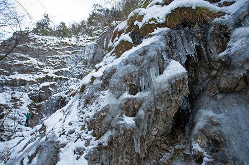 Icicles in Slovakia nature. Wintertime in nature. Cold valley.  photo