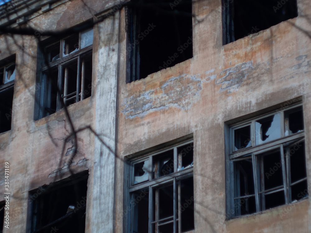 broken Windows after the bombing and fire. airstrike. broken Windows. abandoned areas of military operations. broken Windows after the bombing and fire. airstrike. broken Windows. abandoned areas of military operations.