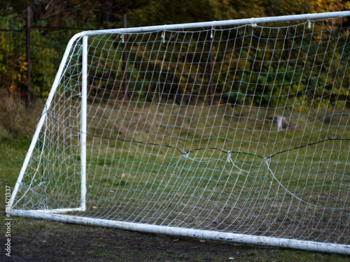 football goal with a net on a natural field. football.