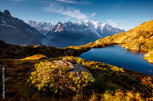 Mighty Mont Blanc glacier with lake Lac Blanc. Location Chamonix resort, Graian Alps, France, Europe.